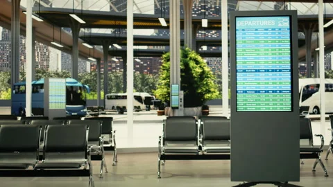 Empty city bus terminal with departure schedule display and urban traffic access Stock Footage 334721152