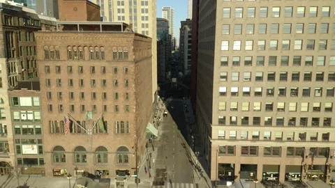 Empty City Streets Between Skyscrapers in Downtown Chicago COVID-19, Aerial Video stock 130404849