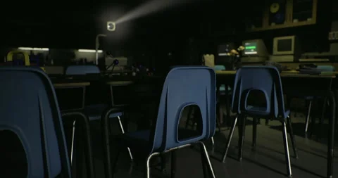 Empty classroom with blue chairs and dim lighting during a lesson Stock Footage 321314795