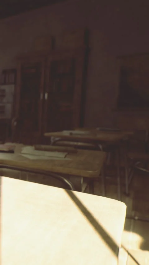Empty classroom captured in warm sunlight revealing forgotten stories Stock Footage 334246809