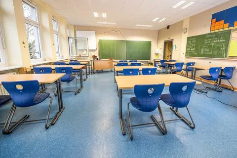 Empty classroom in germany due to Corona virus as school are closed schools s Stock Photos