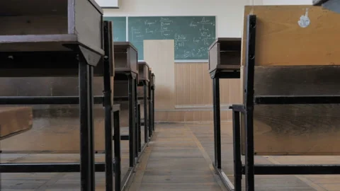 Empty Classroom With Old Chairs And Tables In Need Of Repair Stock Footage 141604811