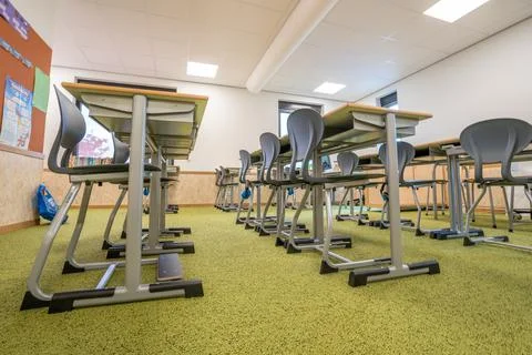 Empty classroom primary school during Covid pandemic Stock Photos