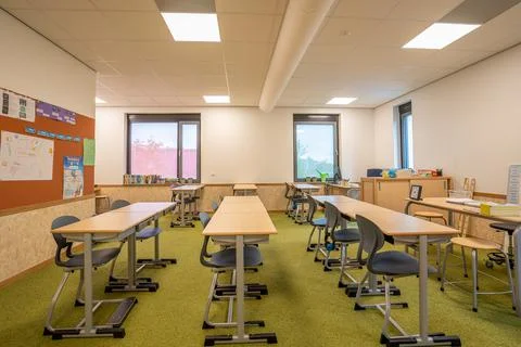 Empty classroom primary school during Covid pandemic Stock Photos