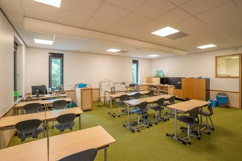 Empty classroom primary school during Covid pandemic Stock Photos