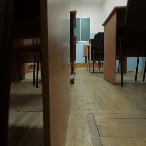Empty classroom at school. The view in the gangway between the desks. Stock Footage 69520473
