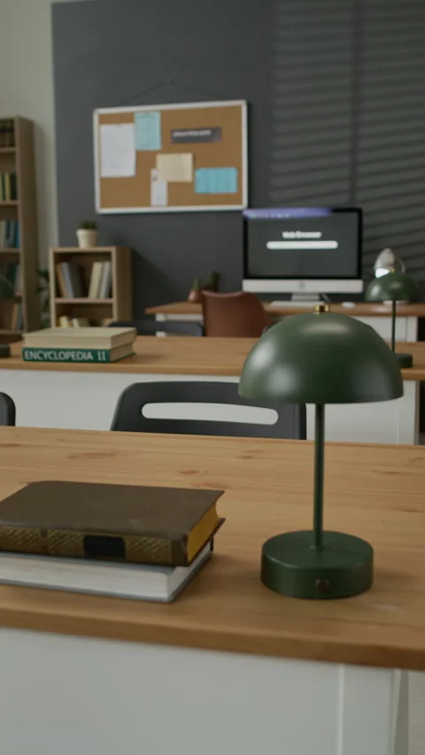 Empty Classroom Showing Books and Computer Screen on Desk Stock Footage 337486921