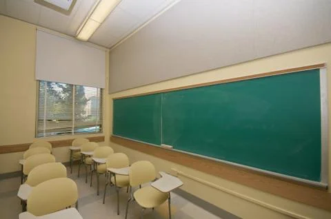 Empty classrooms in college Stock Photos