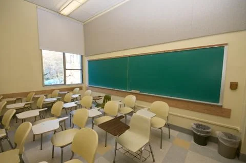 Empty classrooms in college Stock Photos