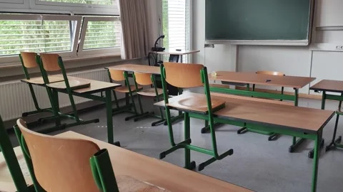 Empty classrooms as school holidays approach Stock Footage 339650219