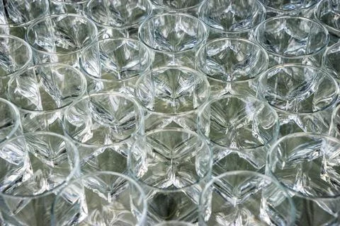 Empty clean glasses are on the table. Preparing dishes for serving Stock Photos