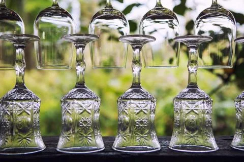 Empty clean glasses in tropical bar Stock Photos