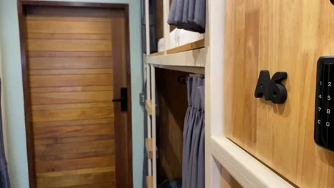 Empty clean hostel room with bunk beds and locker, Thailand Видео 230513503