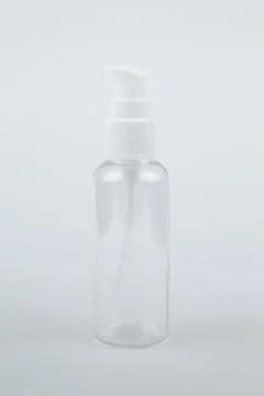Empty Clear Bottle isolated on white background. Cosmetic. Spa Stock Photos
