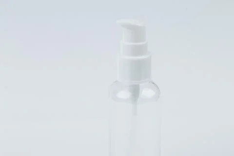 Empty Clear Bottle isolated on white background. Cosmetic. Spa Stock Photos