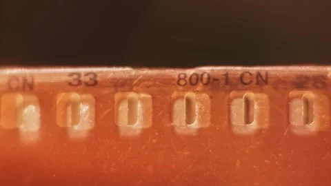 Empty clear damaged 35 mm film photography strip slo mo 4k Stock Footage 340585447