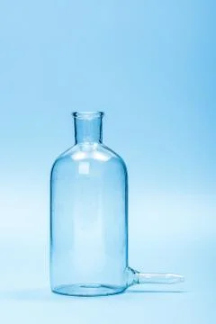 Empty clear filtering bottle Stock Photos