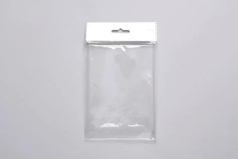 Empty clear plastic bag with resealable top on gray background Stock Photos