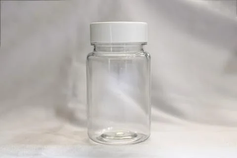 Empty Clear Plastic Bottle with White Screw Cap for Packaging Stock Photos