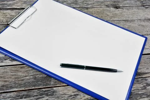 Empty clipboard on table Stock Photos
