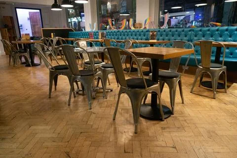 An Empty Closed Cafe with Dining Seats and Table Stock Photos