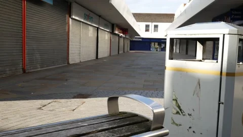 Empty closed corona virus small town retail shop security shutter in empty 動画素材 136241636