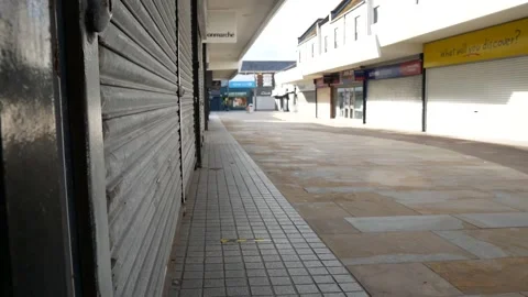 Empty closed corona virus small town retail shop security shutter in empty 動画素材 136241657