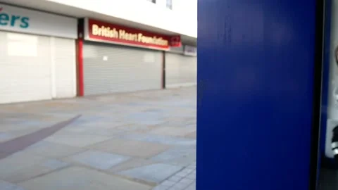 Empty closed corona virus small town retail shop security shutter in empty 動画素材 136241739