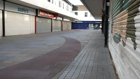 Empty closed corona virus small town retail shop security shutter in empty 動画素材 136241789