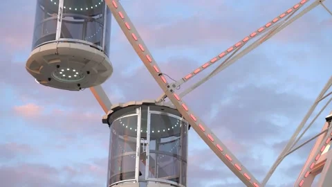 Empty closed glass cabins Ferris wheel Stock Footage 180006790