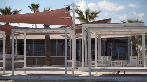 Empty closed for winter beach cafe during off-season on Cyprus. No people around Stock-Footage 79043218