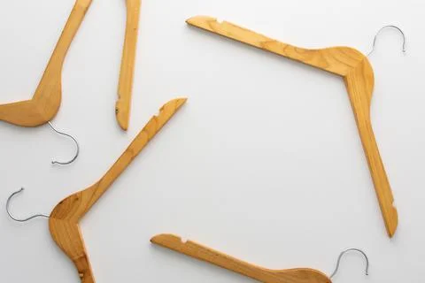 Empty clothes hangers isolated Stock Photos