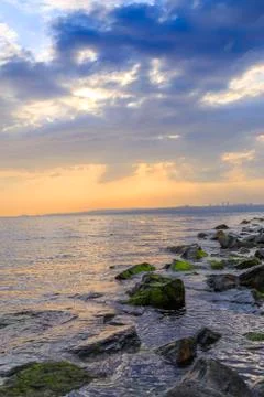 Empty cloudy sky from oand mossy rocks Photos