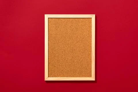 Empty coark board on red background Stock Photos