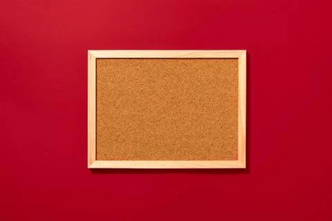 Empty coark board on red background Stock Photos