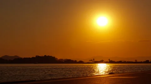 Empty coastline warming by evening sun. Stock Footage 313542541