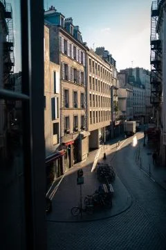 Empty cobblestone street in Paris Stock Photos