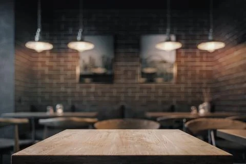 Empty coffe table at night over defocused background Stock Photos