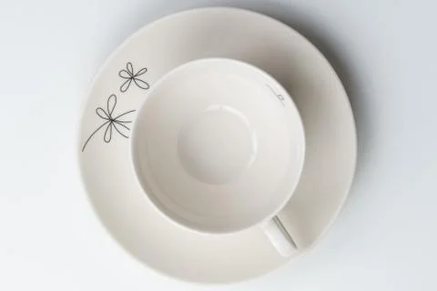 Empty coffee cup. Above view. Isolated on white background Stock Photos