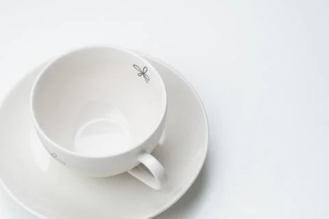 Empty coffee cup. Above view. Isolated on white background Stock Photos