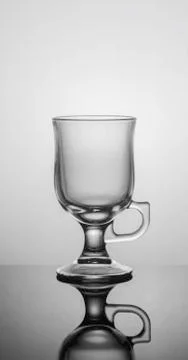 Empty coffee cup on dark background with back light Stock-Fotos