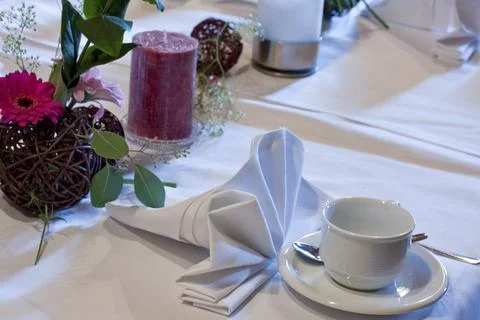 Empty coffee cup on a decorated table Stock Photos