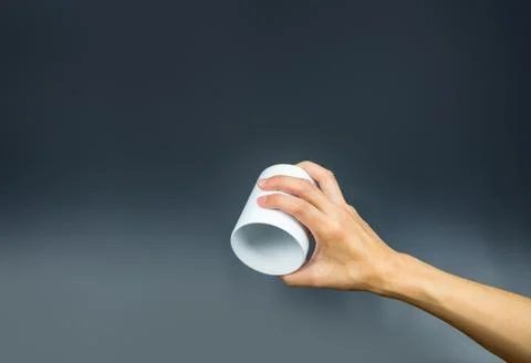 Empty coffee cup, hand holding upside down Stock Photos