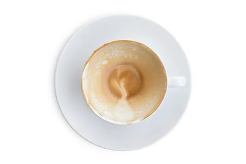 Empty coffee cup. Latte coffee cup after drink top view isolated on white bac Fotos de archivo