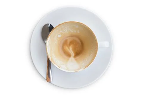 Empty coffee cup. Latte coffee cup after drink top view isolated on white bac Fotos de archivo