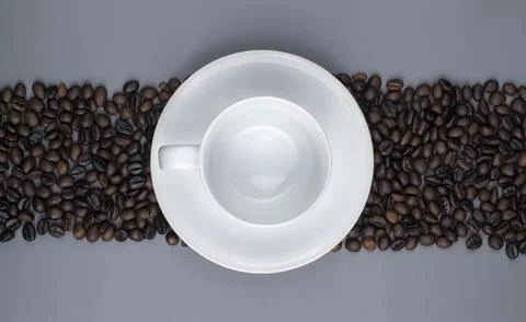 Empty Coffee Cup on Roasted Beans Stripe Gray Background Stock Photos