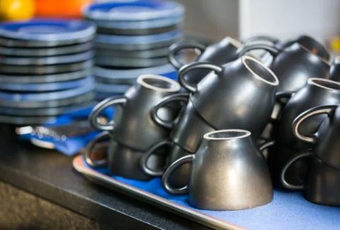 Empty coffee cups are ready on the plate 스톡 사진