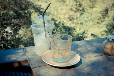 Empty coffee glass on wooden teble Stock Photos