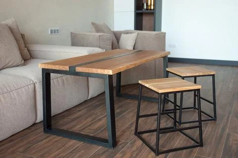 Empty coffee table over defocused coffee shop background with copy space Stock Photos