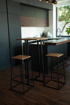 Empty coffee table over defocused coffee shop background with copy space Stock Photos